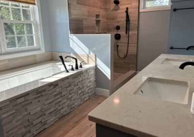 A newly remodeled bathroom by massoglia contracting.